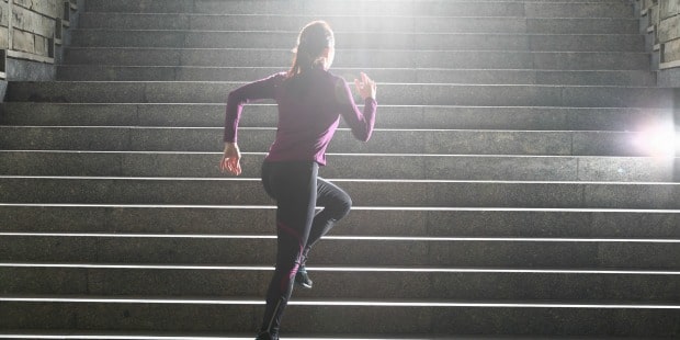 Woman running stairs