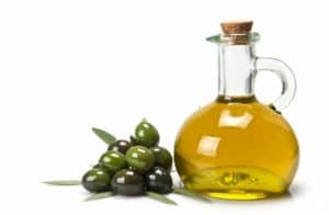 Bottle of olive oil and olives