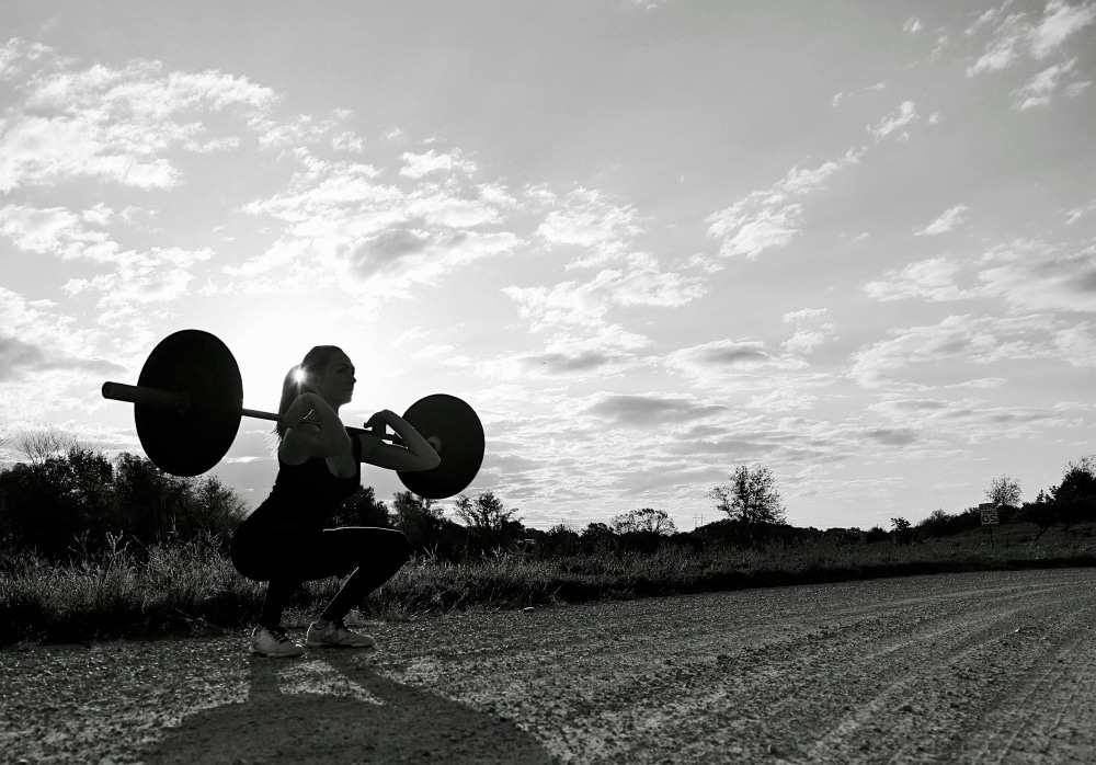 Woman lifting weights.