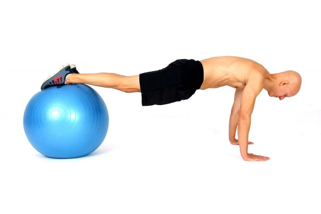 The 14 Best Ab Exercises - Plank with Feet on Ball
