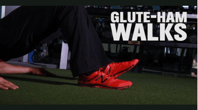 Glute Hamstring Walkout via Men's Health