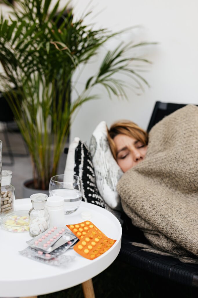 Image of a woman sleeping. Source: Pexels 