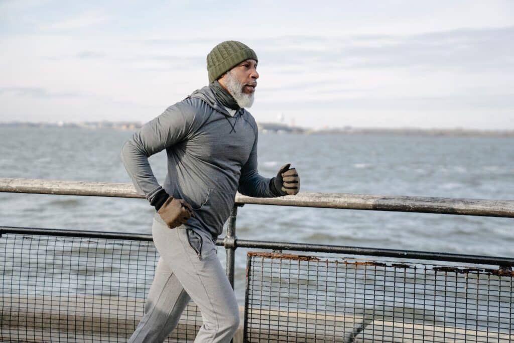 Image of a man in his 50s jogging. Source: Pexels