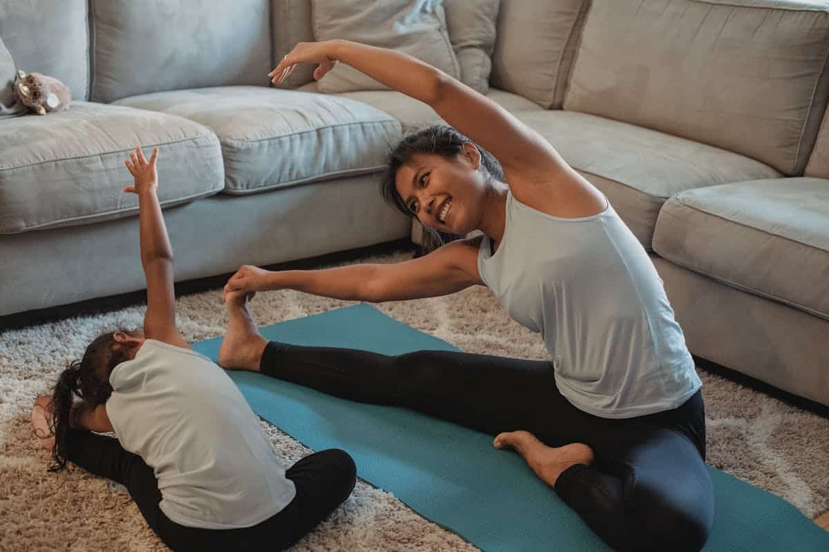 A woman and a child exercising